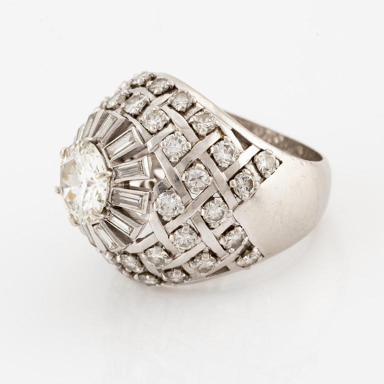 A platinum ring with an old-cut diamond ca 1.90 cts ca I/J i.