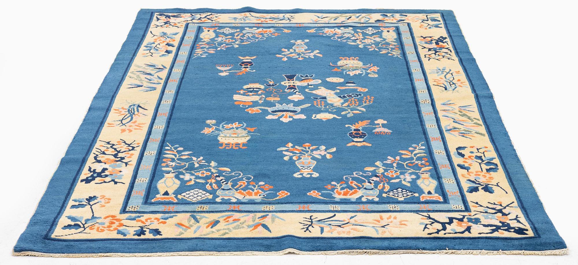 An antique, Beijing rug, north China, circa 1920. (243x163 cm).