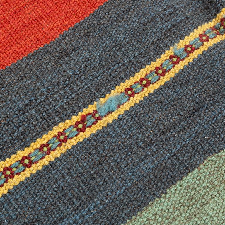 A persian kilim,  ca 242 x 181 cm.