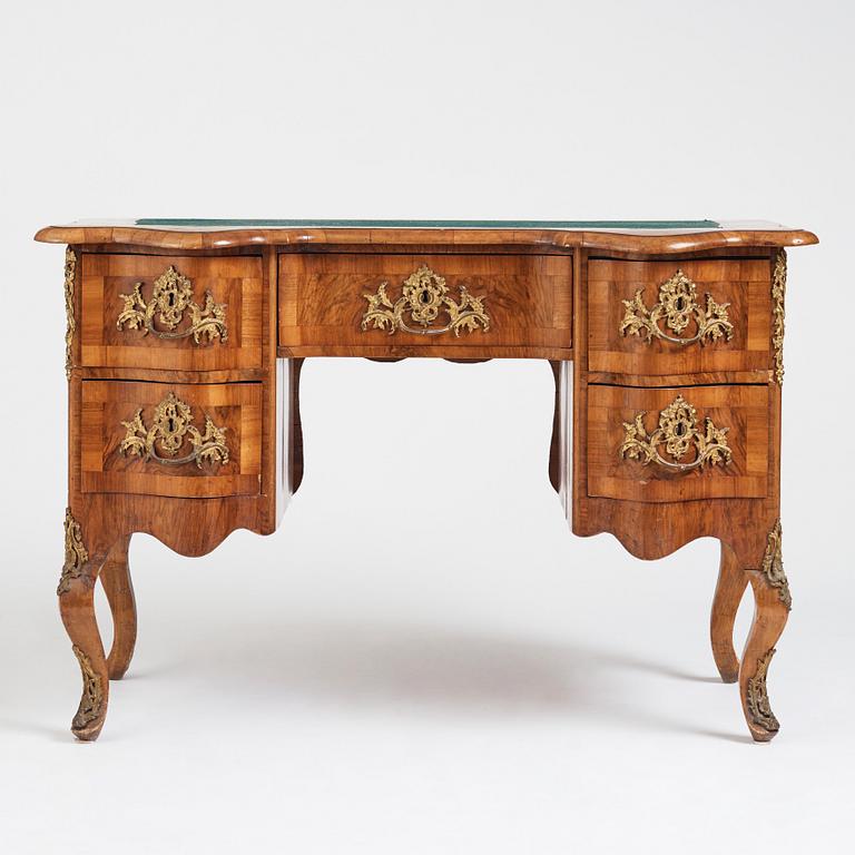 A north european rococo writing table.