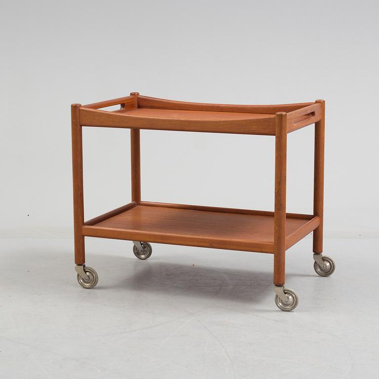 A mid 20th century teak serving trolley by Hans J Wegner, Andr. Tuck, Denmark.