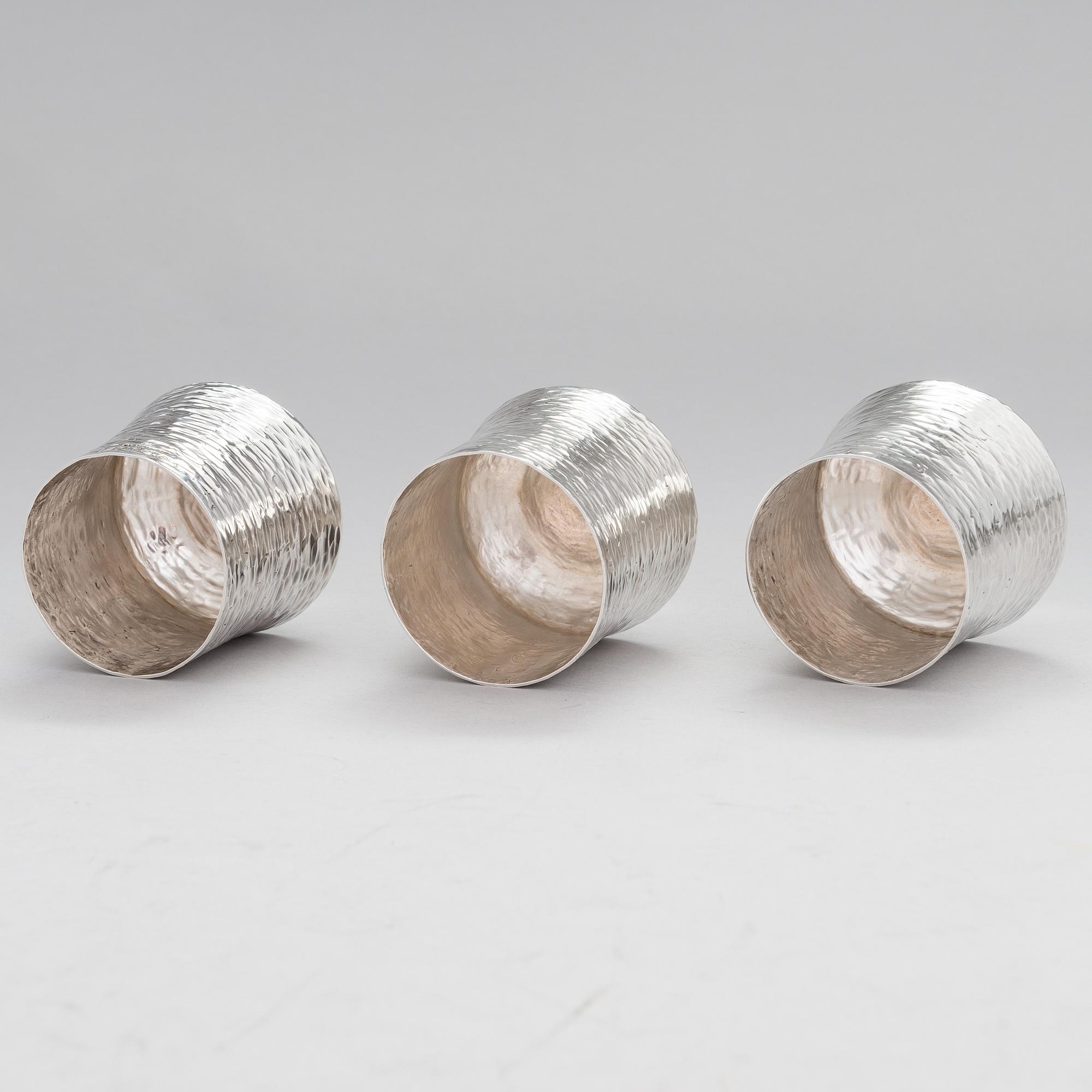 TAPIO WIRKKALA, A set of three silver beakers, marked TW, Kultakeskus, Hämeenlinna, Finland 1976.