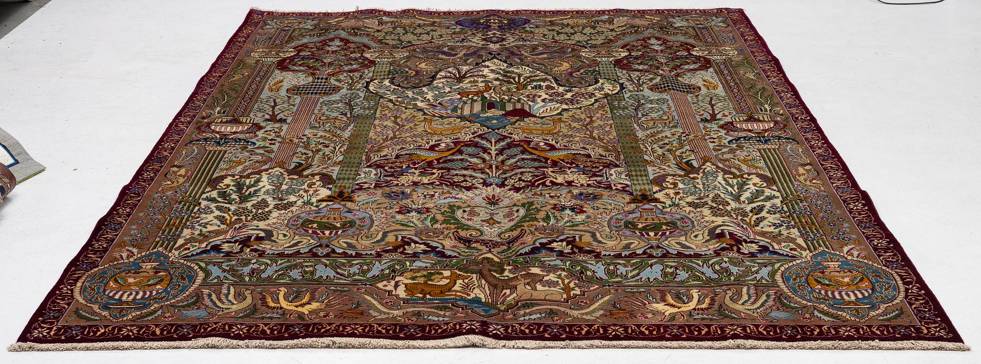 A Kashmar carpet, c. 347 x 242 cm.