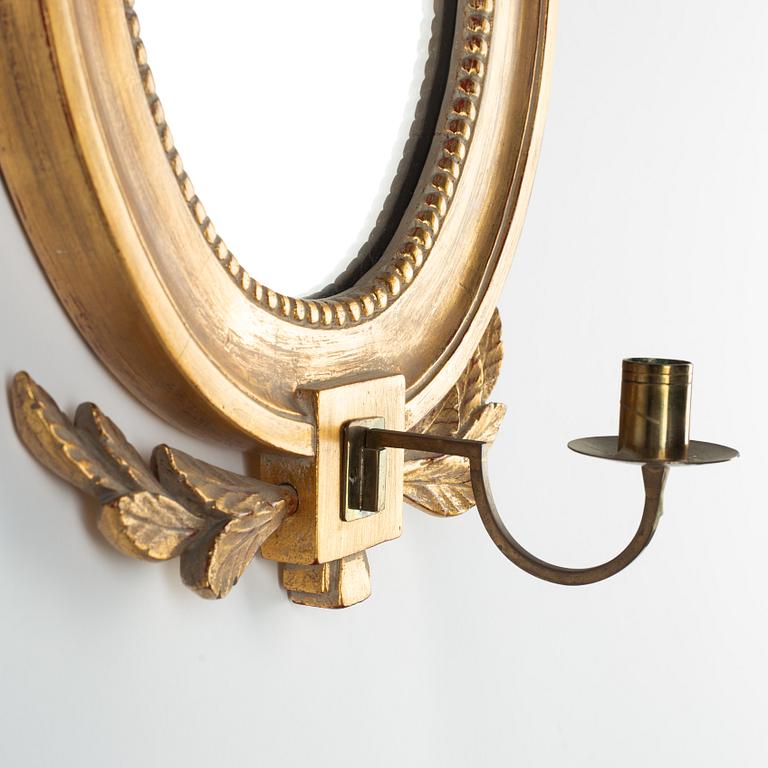 A pair of Gustavian style mirror sconces, early 20th Century.