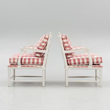 A pair of armchairs a pair, so-called Gripsholm chairs, Gustavian style, 20th century.