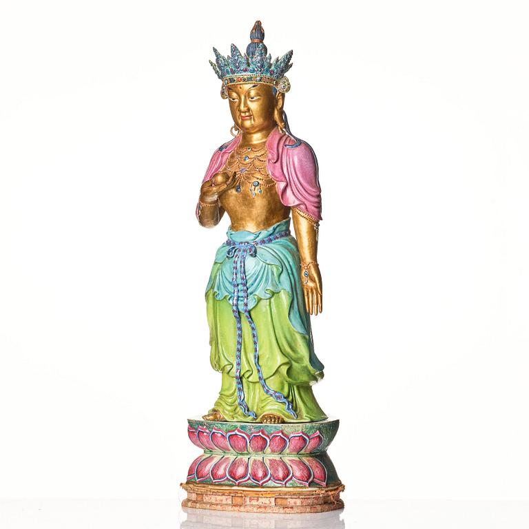 A large porcelain figure of a Bodhisattva, Qing dynasty with Yongzheng mark.