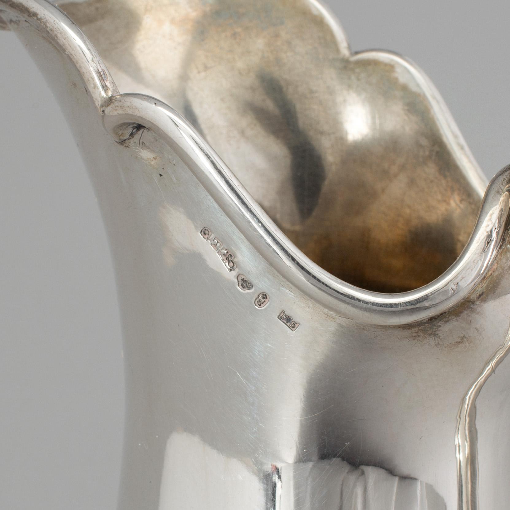 A Swedish silver water pitcher, maker's mark Gustaf Theodor Folcker, Stockholm, 1860. Weight 647 g.