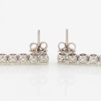 A pair of earrings in 18K white gold with cultured South Sea pearls and round brilliant-cut diamonds.