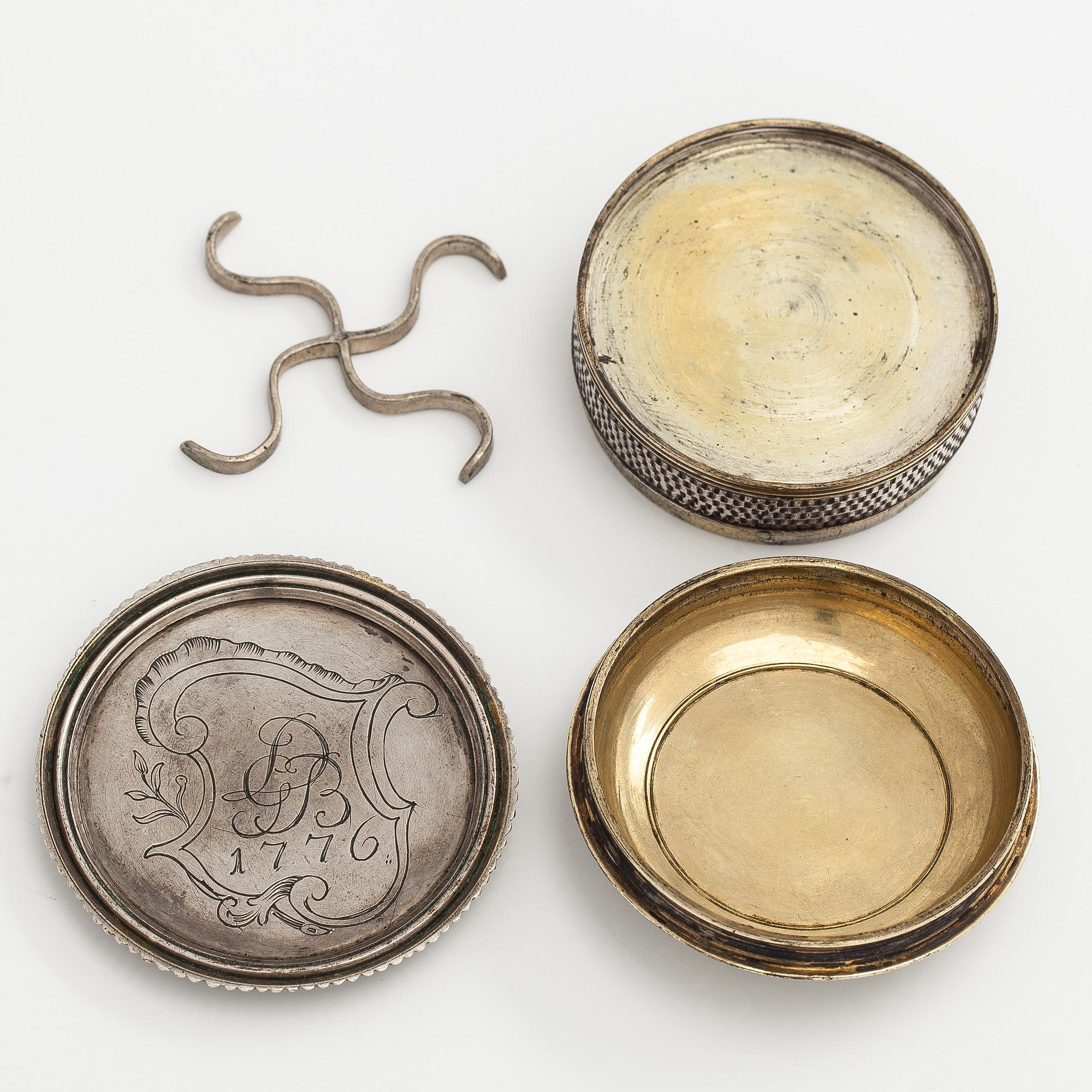 Silver case with concealed compartment, engraved 1776.