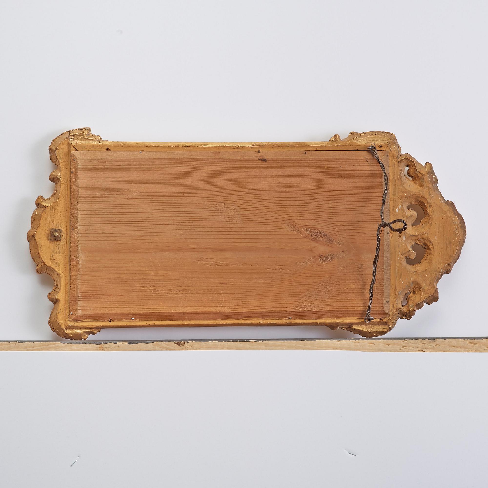 A pair of Swedish Rococo 18th century one-light mirror girandoles.