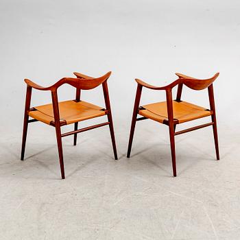 Rolf Rastad & Adolf Relling, a pair of teak and rattan "Bambi" easy chairs by Rastad & Relling, Norway 1950-60's.