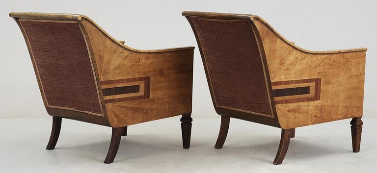 A pair of 1930's armchairs attributed to Axel Larsson,
Svenska Möbelfabrikerna, Bodafors.