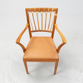 A model 1165 armchair by Josef Frank for Firma Svenskt Tenn.