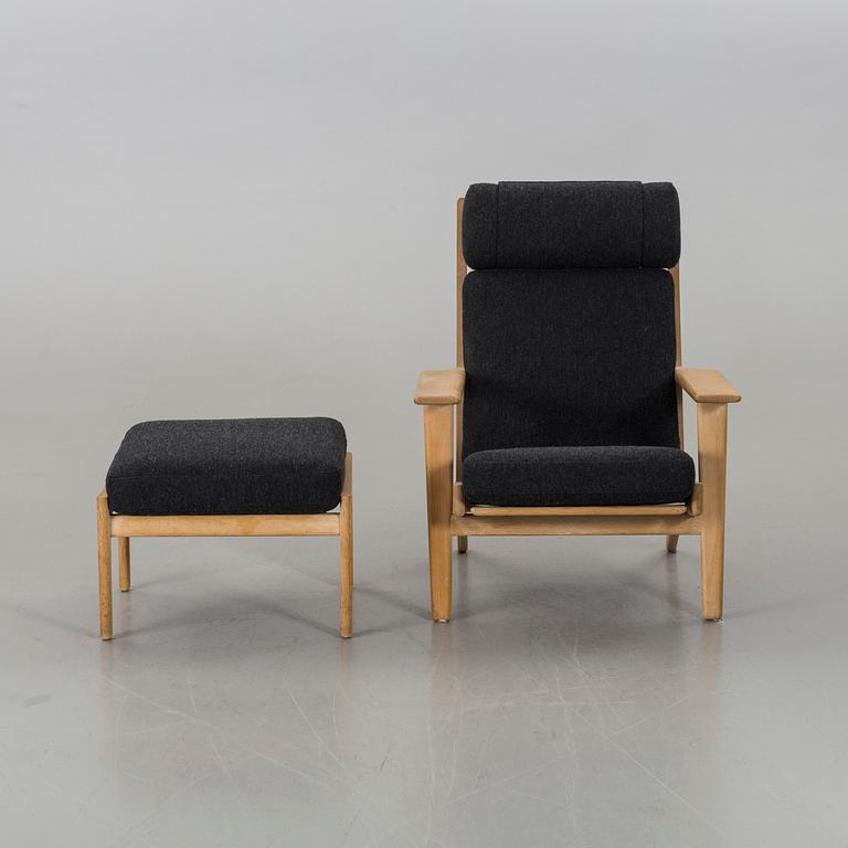 A HANS J WEGNER "GE 290" ARMCHAIR AND STOOL, Getama.