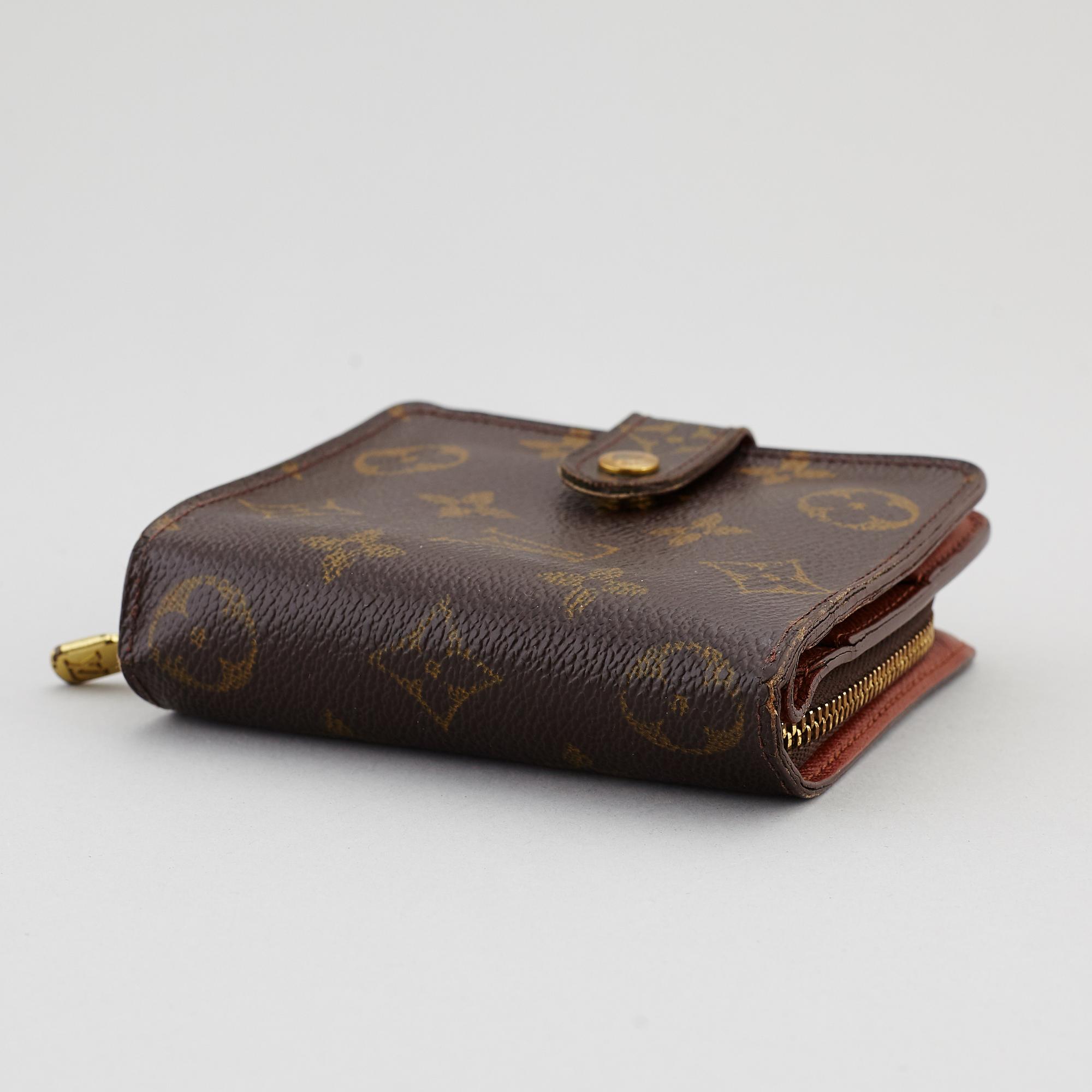 LOUIS VUITTON, a monogram canvas wallet.