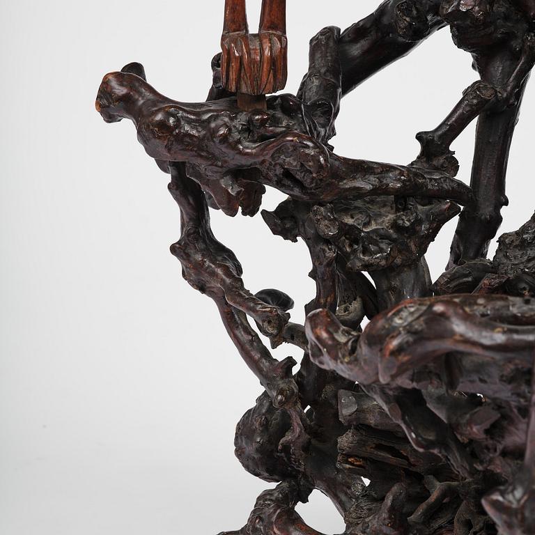 A large well sculptured root sculpture of 'Sholau and attendant', late Qing dynasty, 19th century.