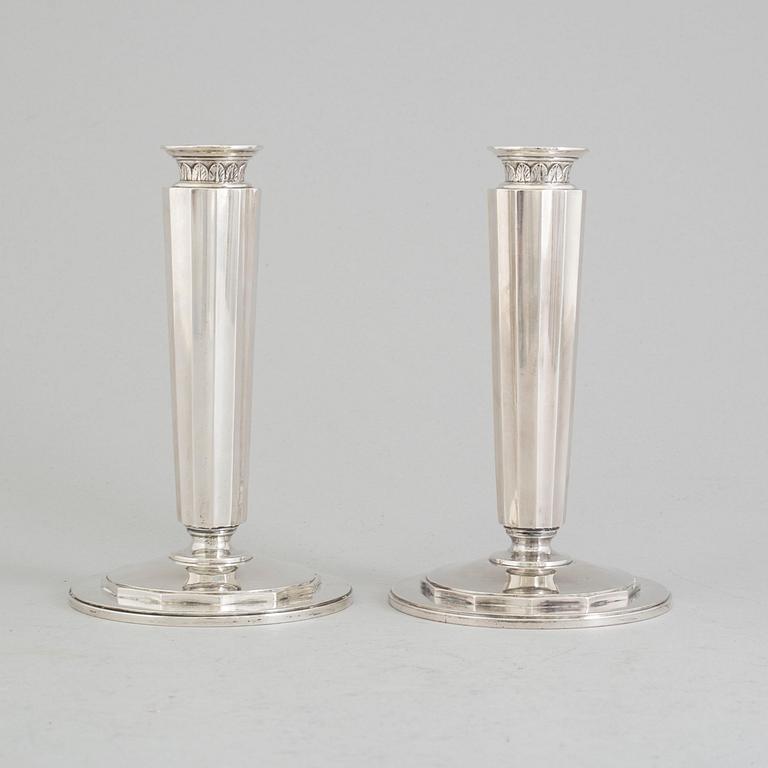 A pair of sterling silver candle sticks by Atelier Borgila. Stockholm 1956.