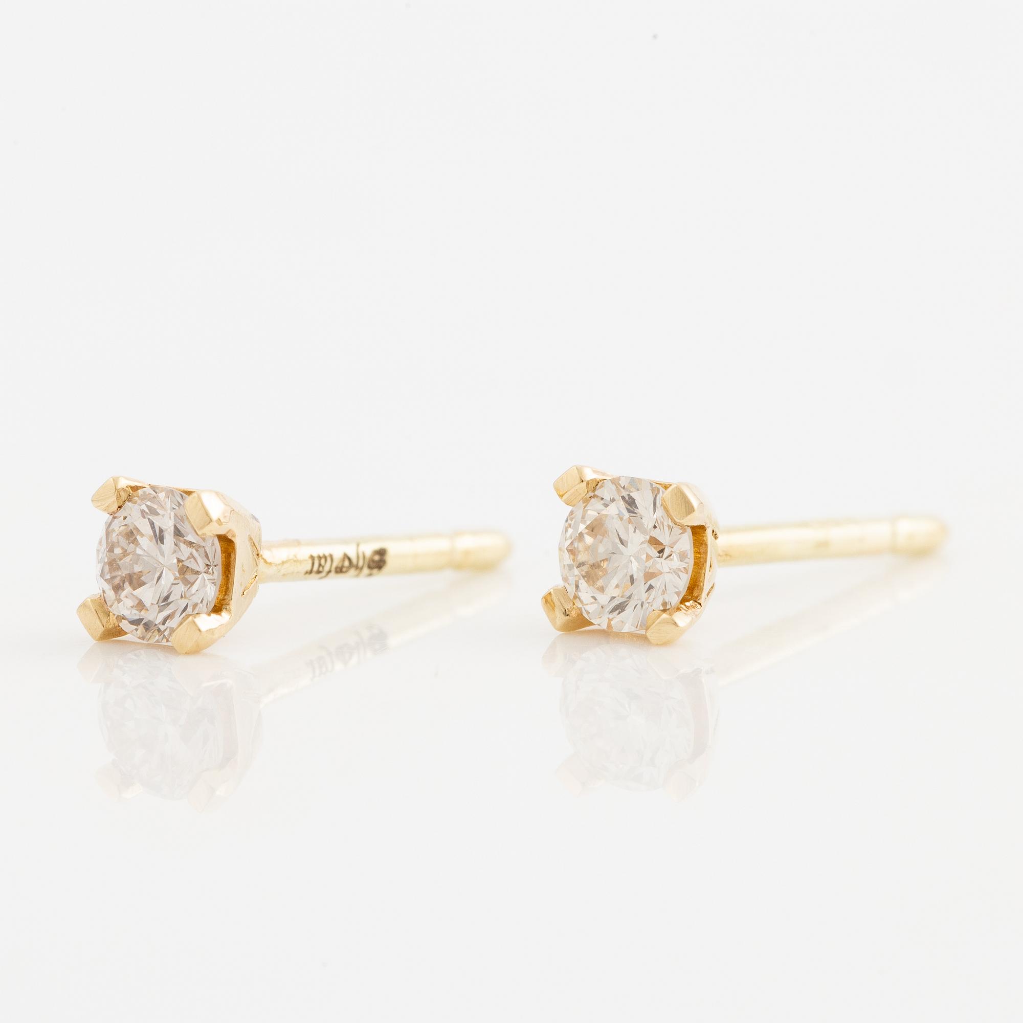 Earrings 14K gold with brilliant-cut diamonds.
