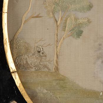 A late Gustavian frame and silk embroidery, dated 1802.