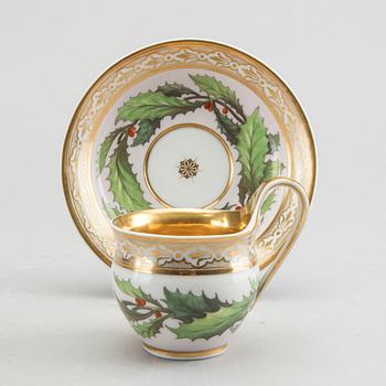 A KPM porcelain cup and saucer ca 1813-15.