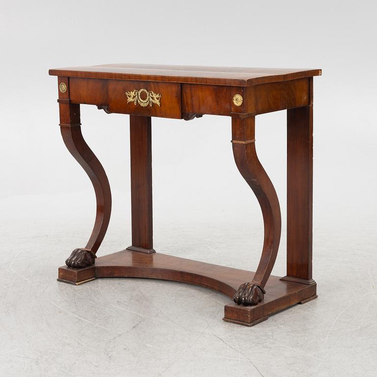 An empire console table, firts half of the 19th century.