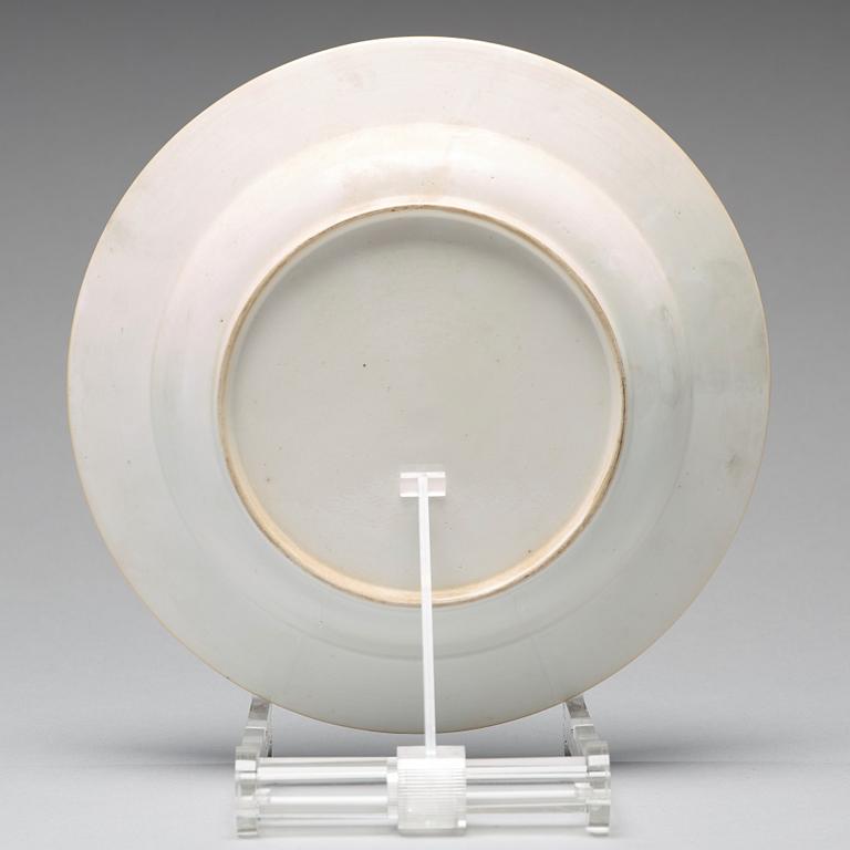 A set of eight blue and white armorial soup dishes, Qing dynasty, 18th Century.