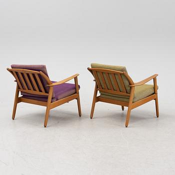 Niels Kofoed, a pair of Danish mid 20th century teak easy chairs.