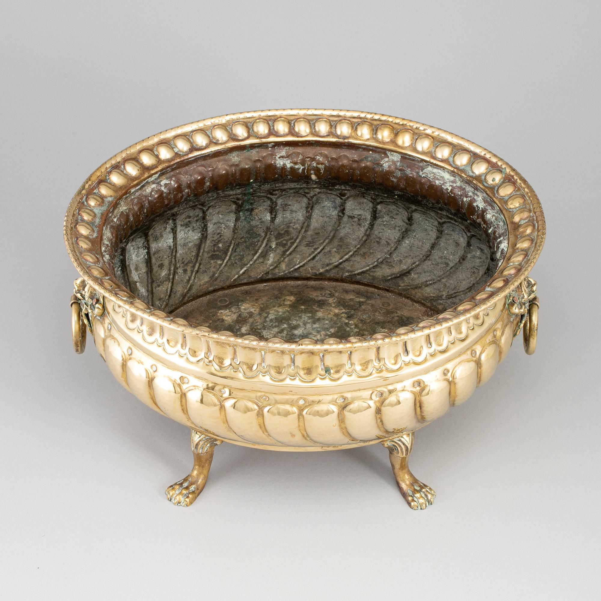 A 19th century brass jardiniere.