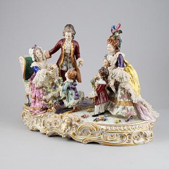 A Rococo style porcelain figurine group, Rudolstadt Volkstedt, Germany, early 20th Century.