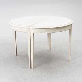 A Gustavian style dining table, late 20th Century.
