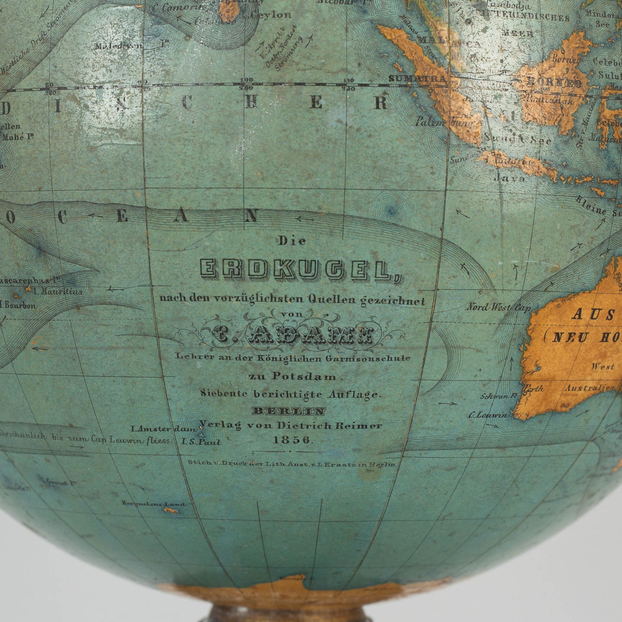A miniature terrestrial globe, marked Adami Berlin Verlag von Dietrich Reimer 1856,