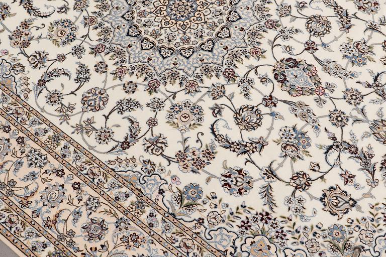 A carpet, Nain part silk s.k 6LAA, ca 310 X 209 cm.