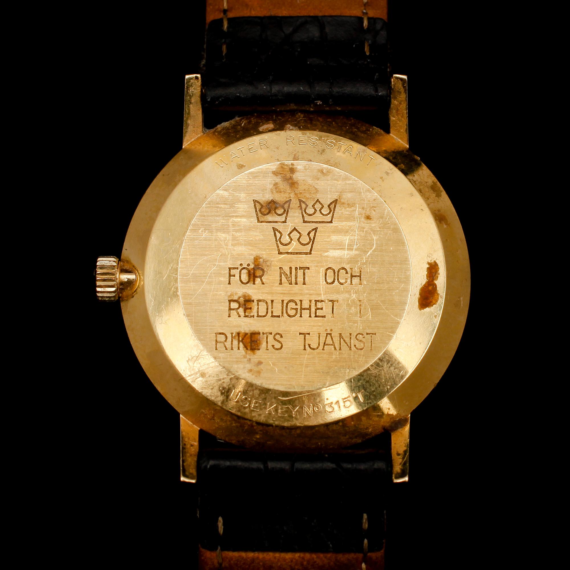 HERRARMBANDSUR, 18 k guld, Tissot, Seastar Seven.