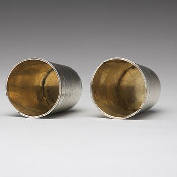 A matched pair of German 17th century parcel-gilt silver, Augsburg (1627-1665).