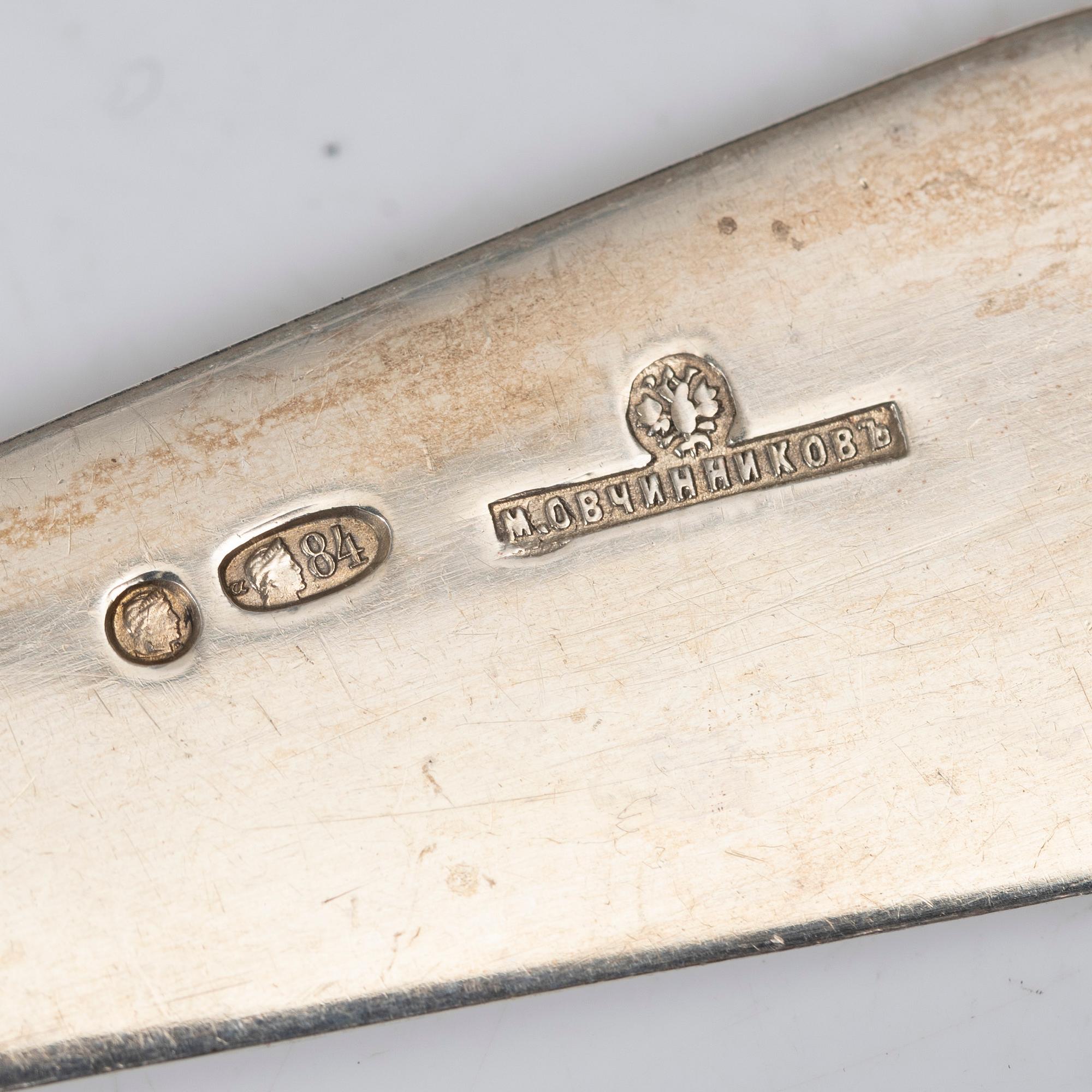 A Russian silver cutlery set, including mark of Ovchinnikov with the Imperial warrant, St Petersburg 1908-16 (24 pieces).