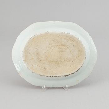 Two famille rose serving dishes and a sauce boat, Qing dynasty, Qianlong (1736-95).