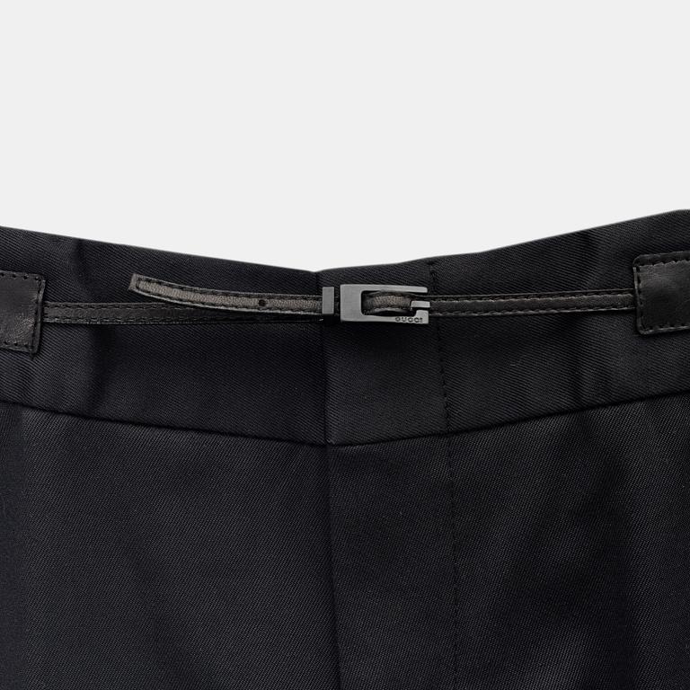 Gucci, a pair of black pants, size 38.