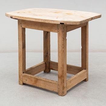 A pine table, 19th Century.