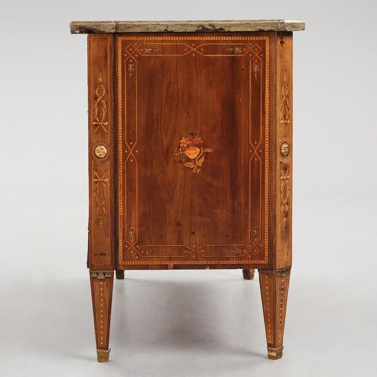 A Gustavian marquetry and ormolu-mounted commode by N. P. Stenström (master in Stockholm 1782 - 90).