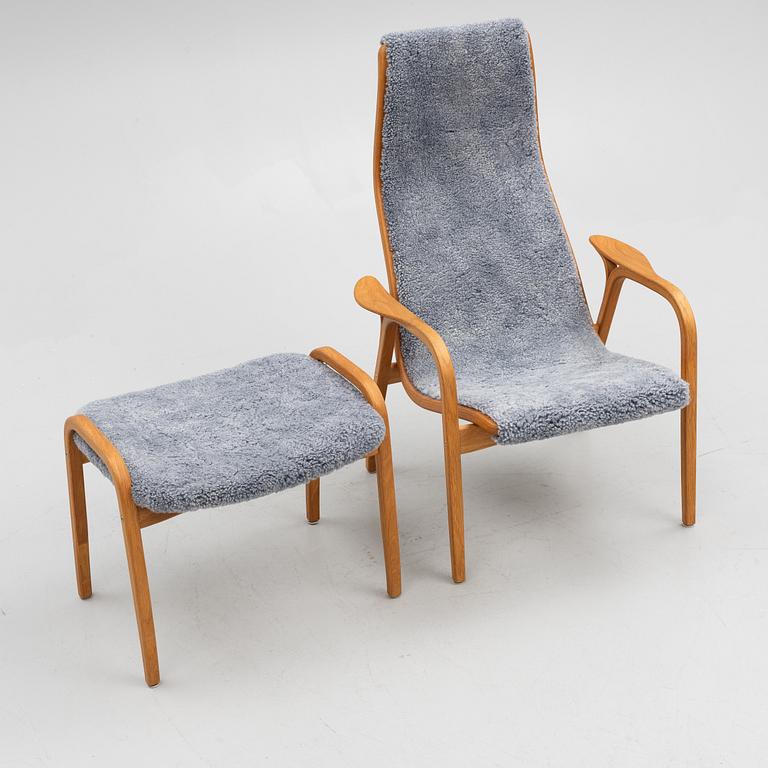 Yngve Ekström, a "Lamino" armchair with ottoman, Swedese, Sweden, 2014.