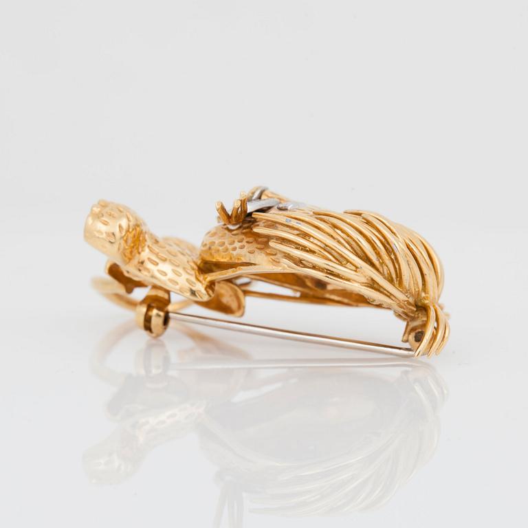 BROSCH i form av ett lejon, med briljantslipade diamanter samt rubiner.