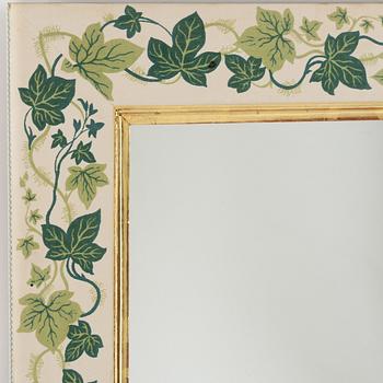 A mirror decorated with ivy attributed to Estrid Ericson for Svenskt Tenn.