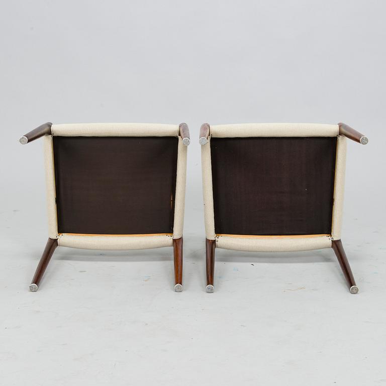 Niels Otto Møller, A 1950s dining table and six '77' chairs for J.L. Møllers Møbelfabrik Denmark.