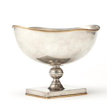 Nils Fougstedt, an oval pewter and brass footed bowl, Herman Bergman, Stockholm 1930.