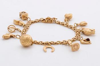 ARMBAND 18K guld berlocker 20,9 g, Stockholm 1958.