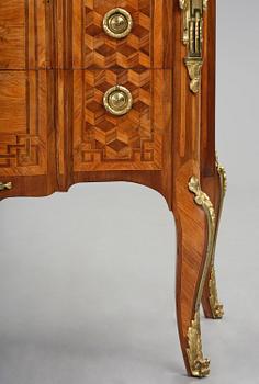A Louis XVI rosewood and amaranth marquetry ormolu-mounted commode by Leonard Boudin (master in Paris 1761).