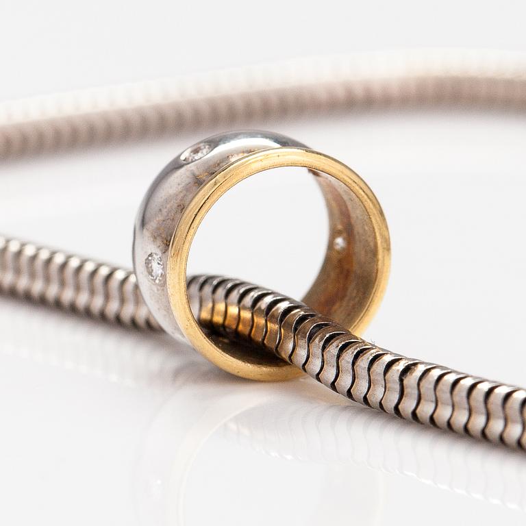 A 14K white and yellow gold bracelet with diamonds ca. 0.03 ct in total.