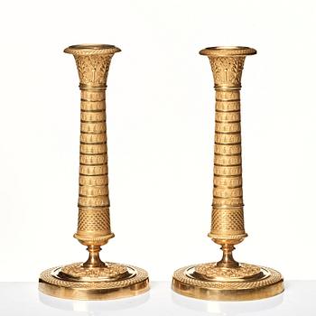 A pair of Empire candlesticks.