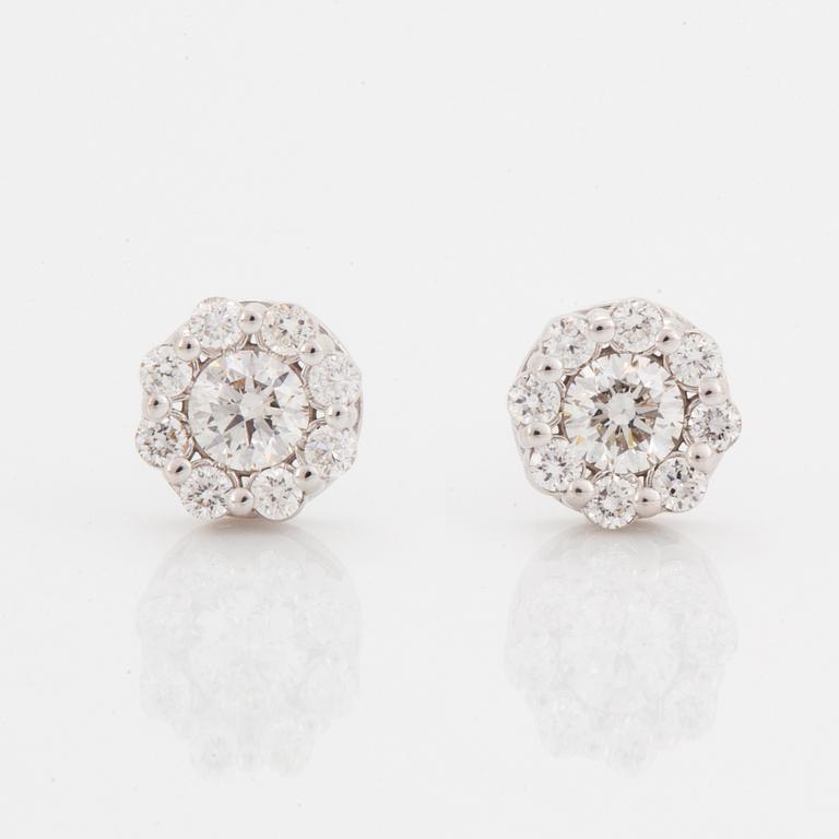 Brilliant-cut diamond earrings.