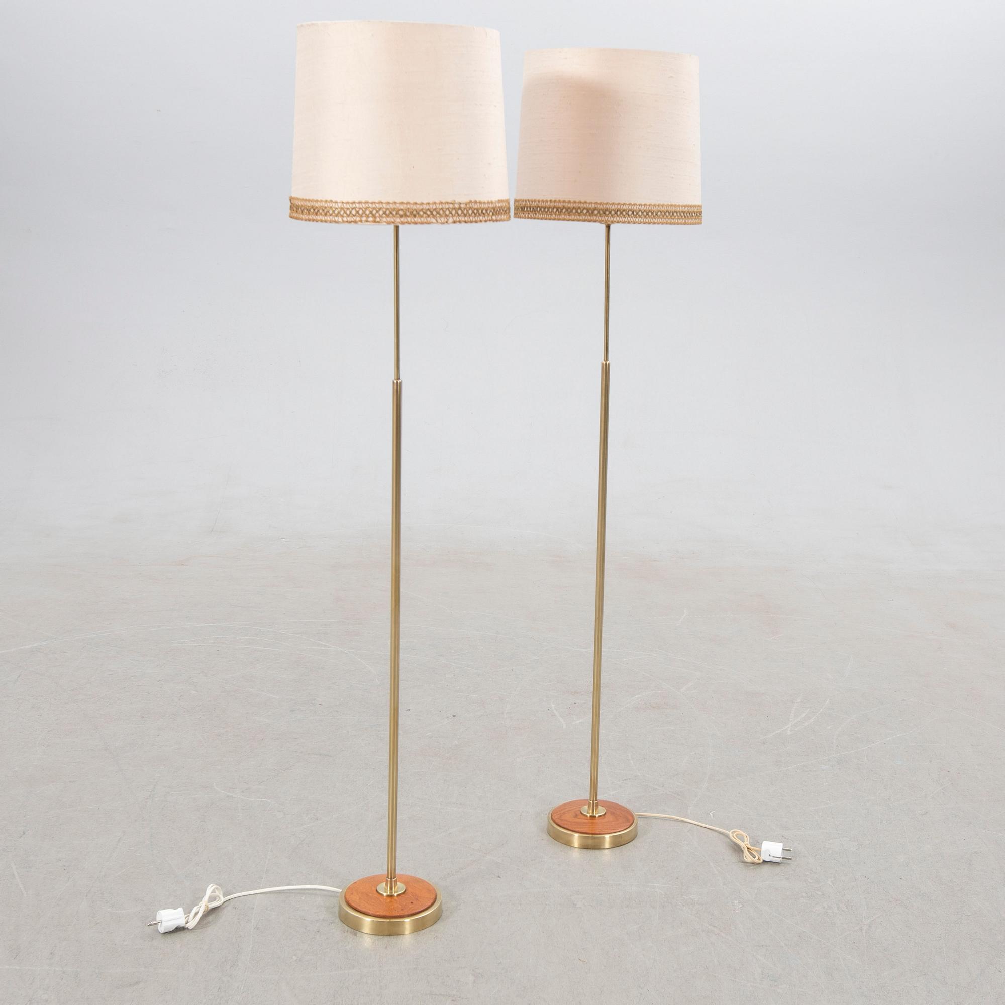 Floor lamps, a pair, mid-20th century.